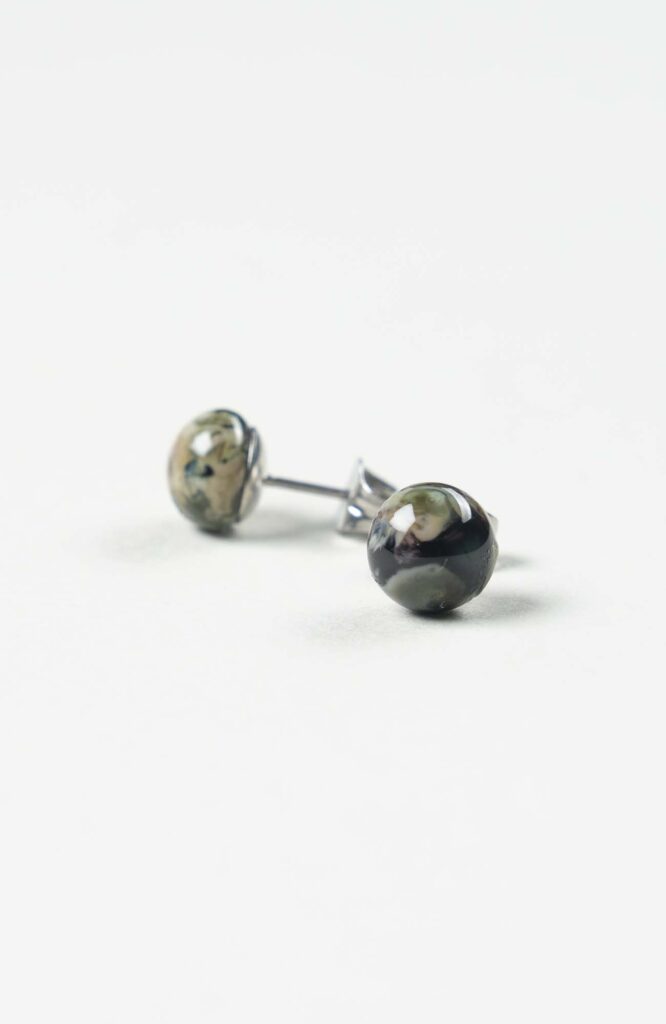 Clous d'oreilles British Argenté