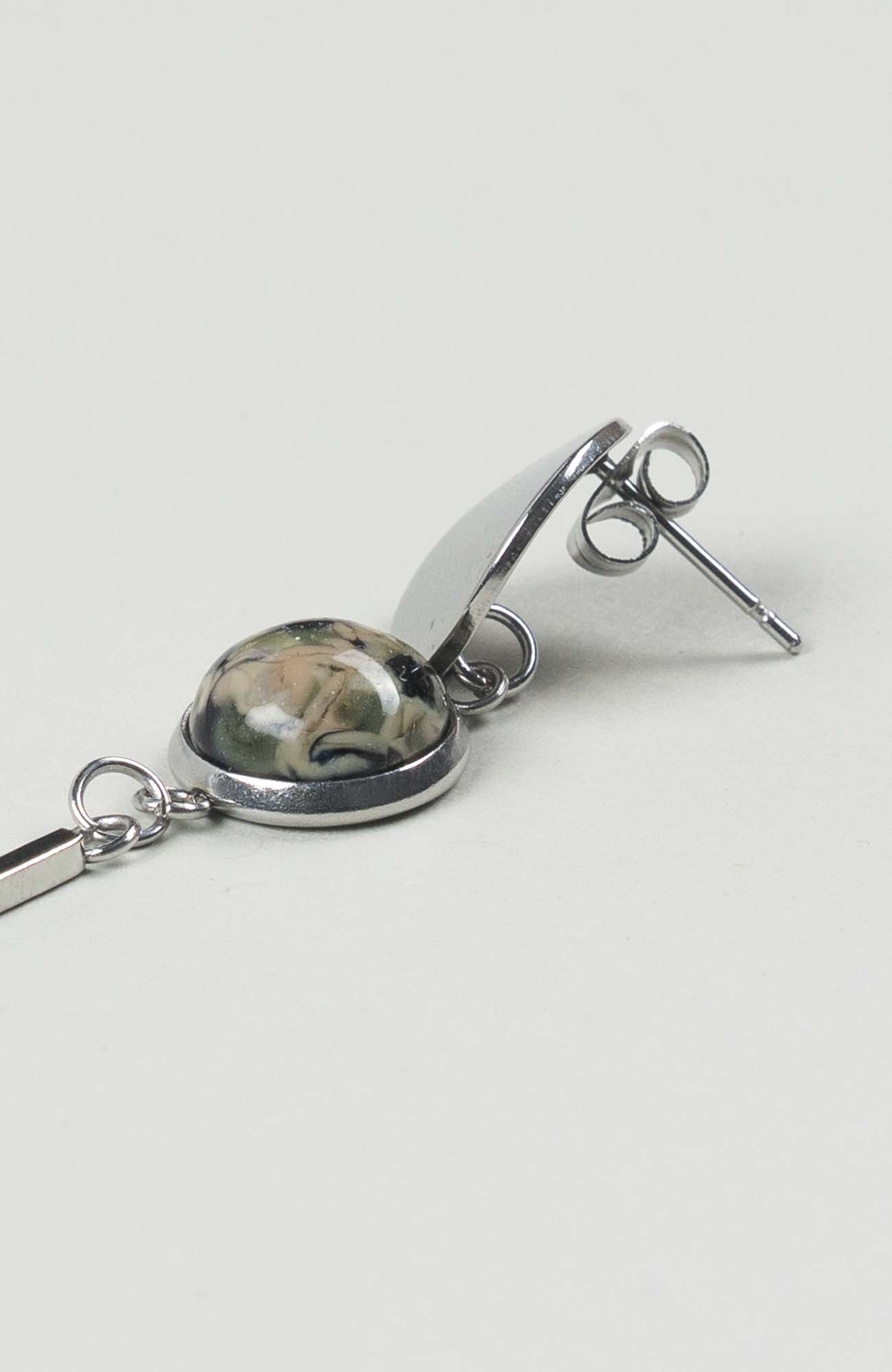 Clous d’oreilles pendants British Argenté