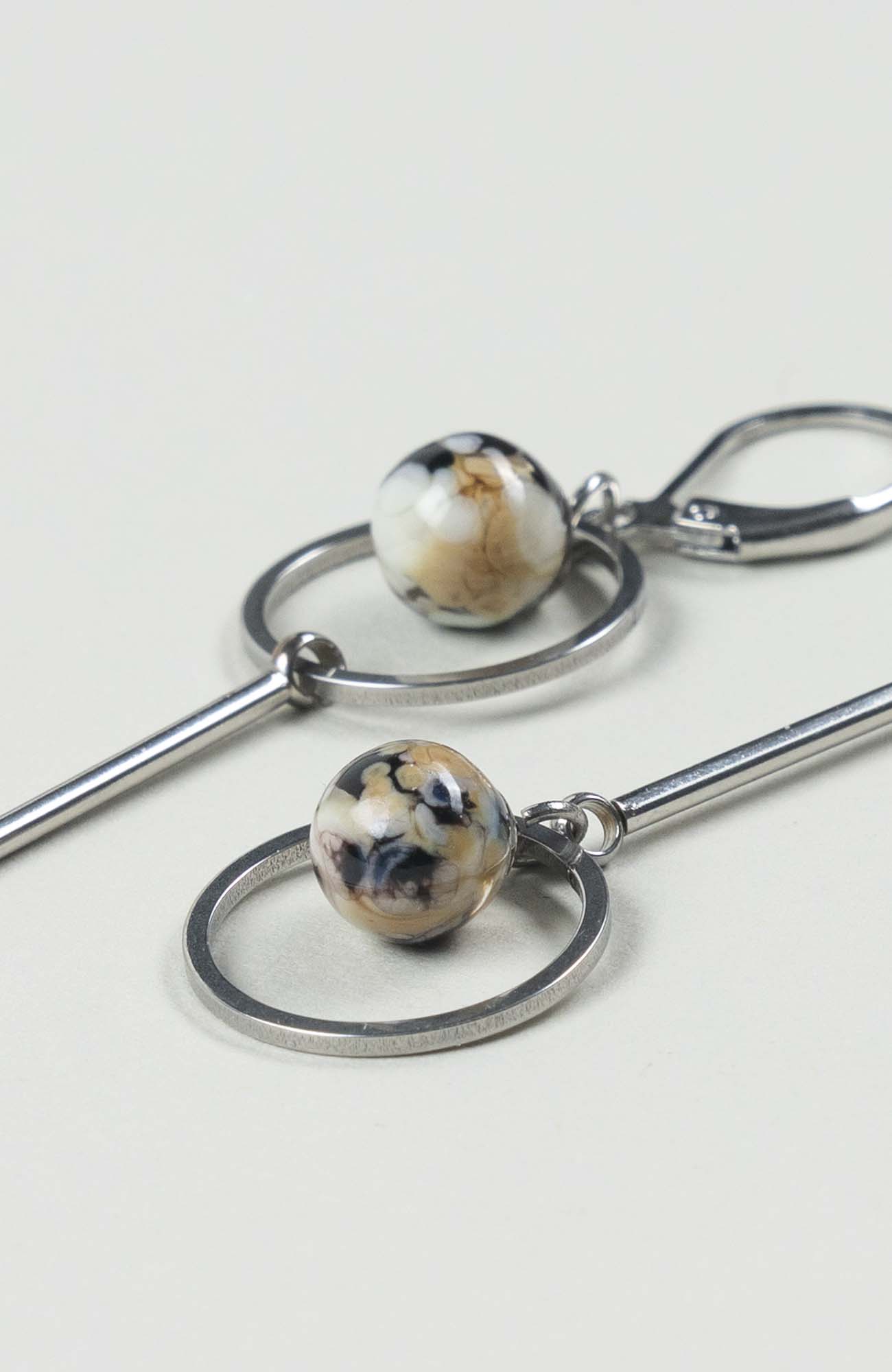 Boucles d&rsquo;oreilles destructurées Intense Argenté
