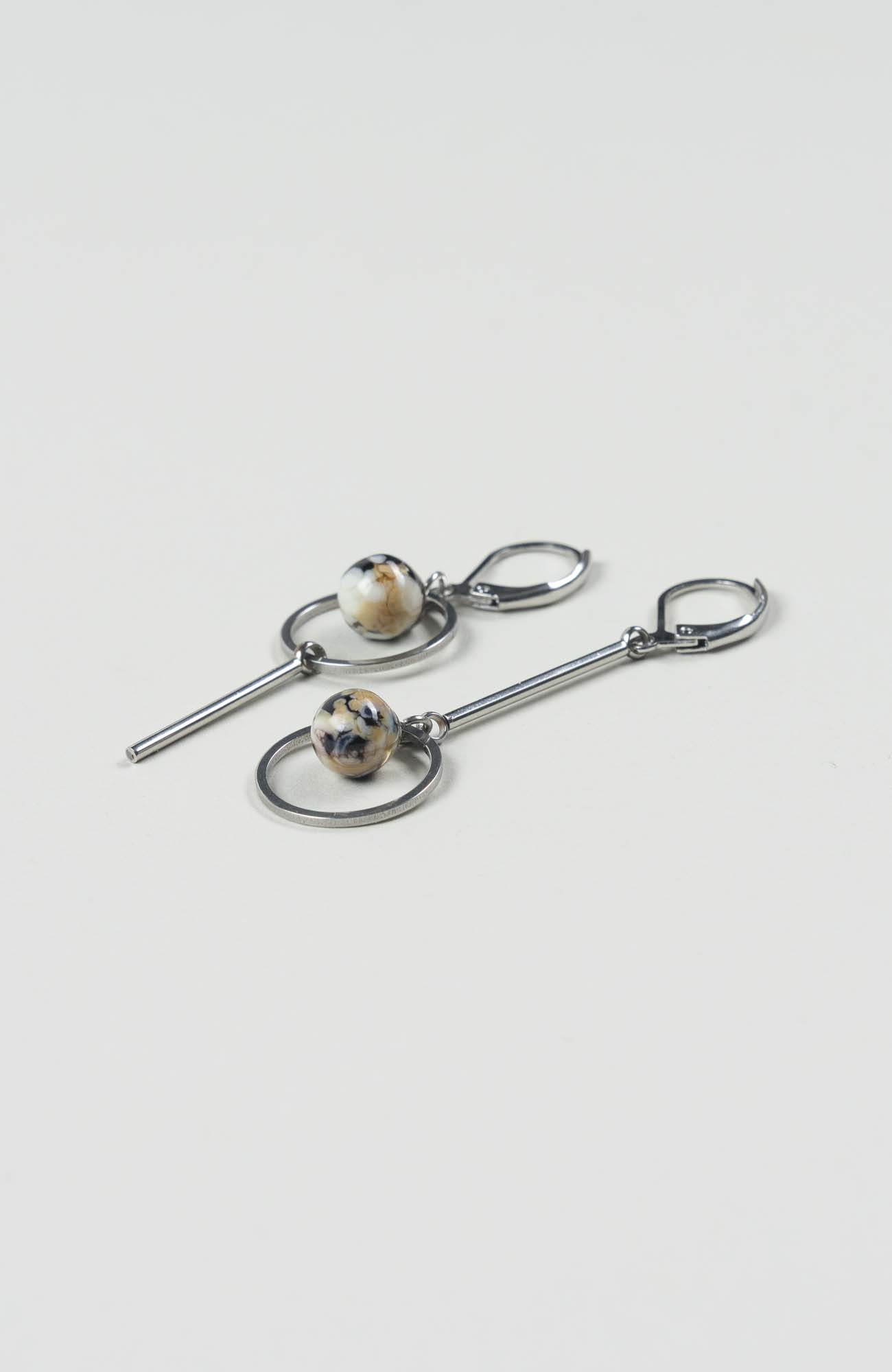 Boucles d&rsquo;oreilles destructurées Intense Argenté