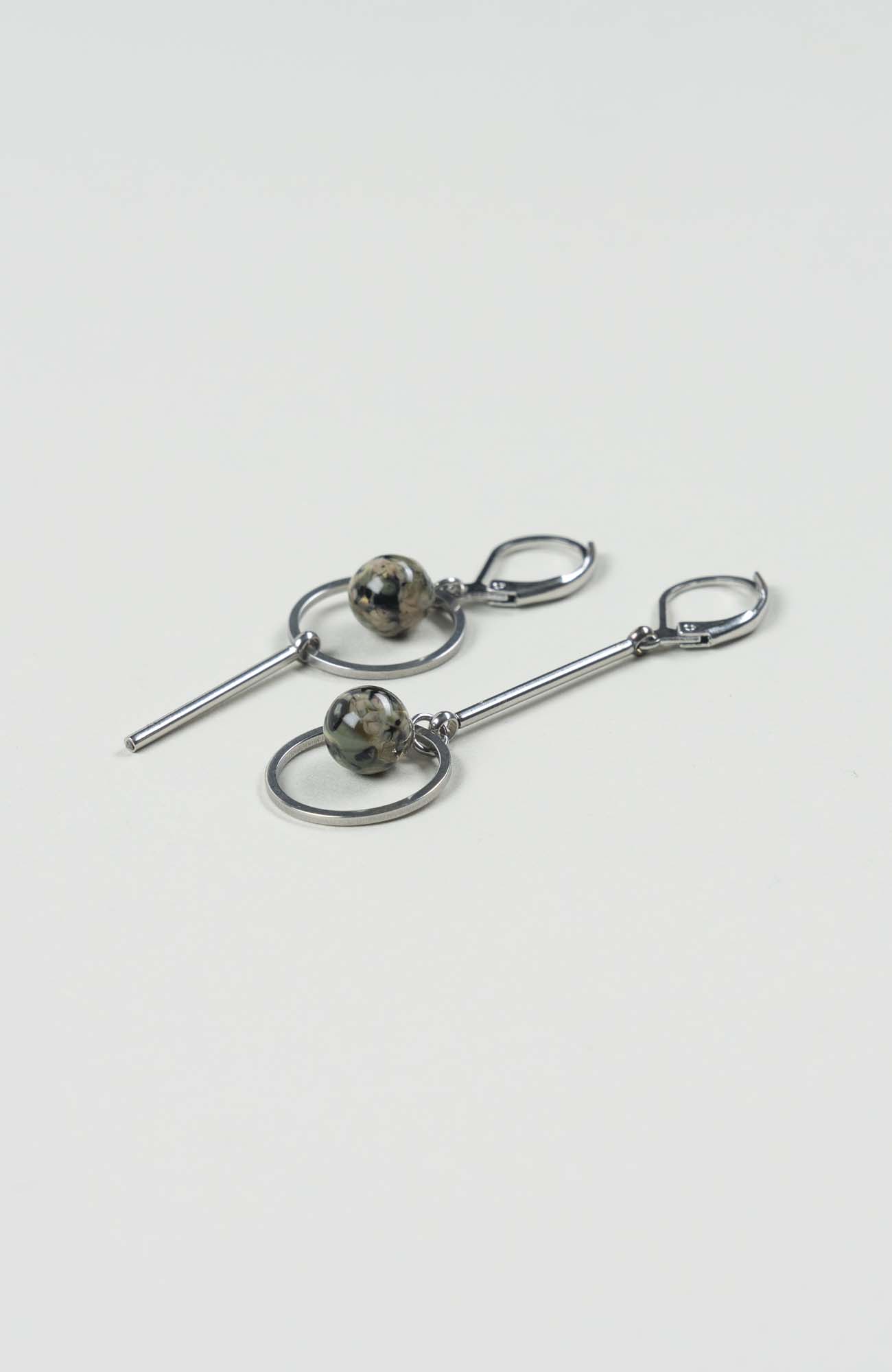 Boucles d’oreilles destructurées British Argenté