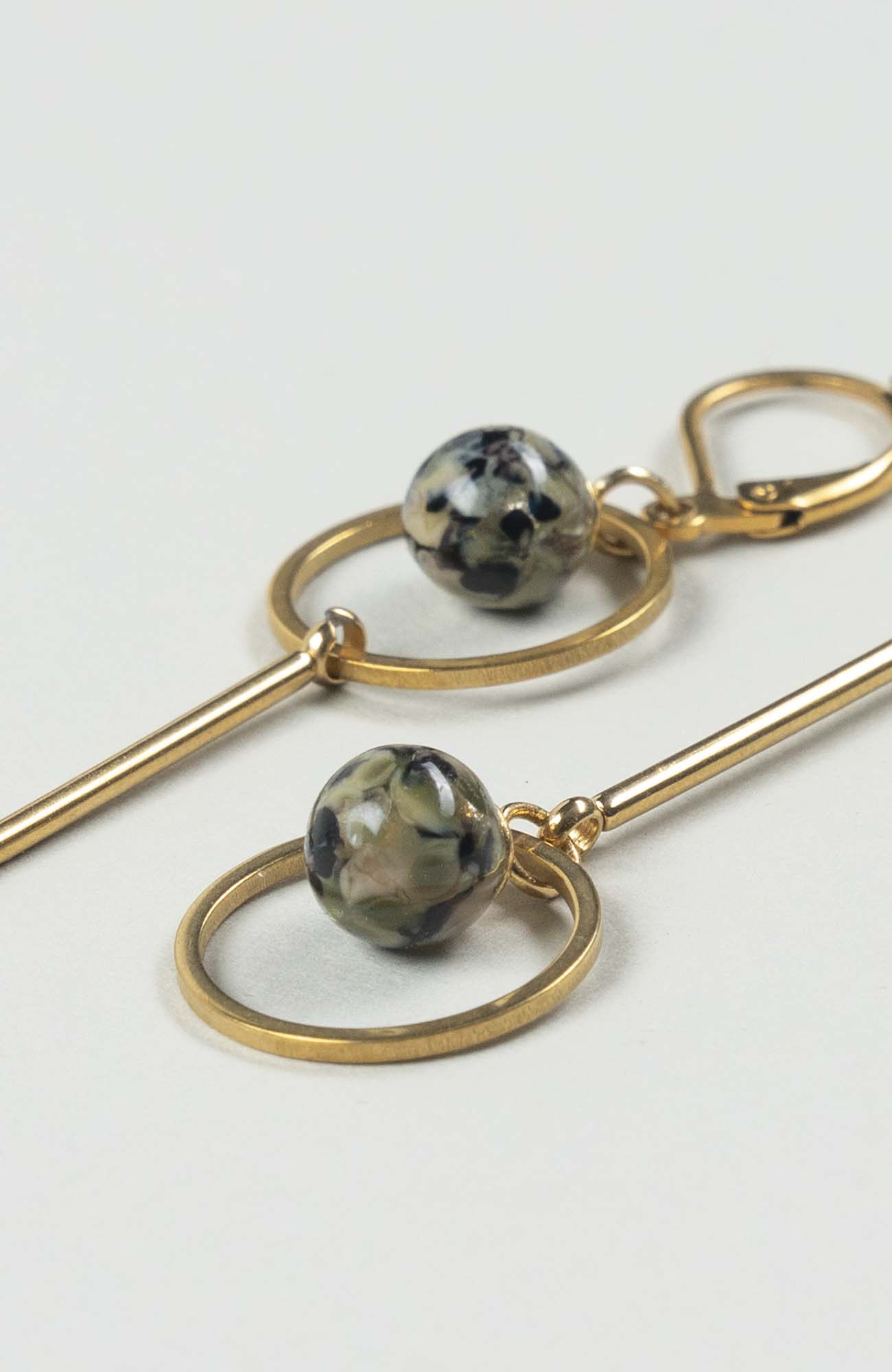 Boucles d’oreilles destructurées British Doré
